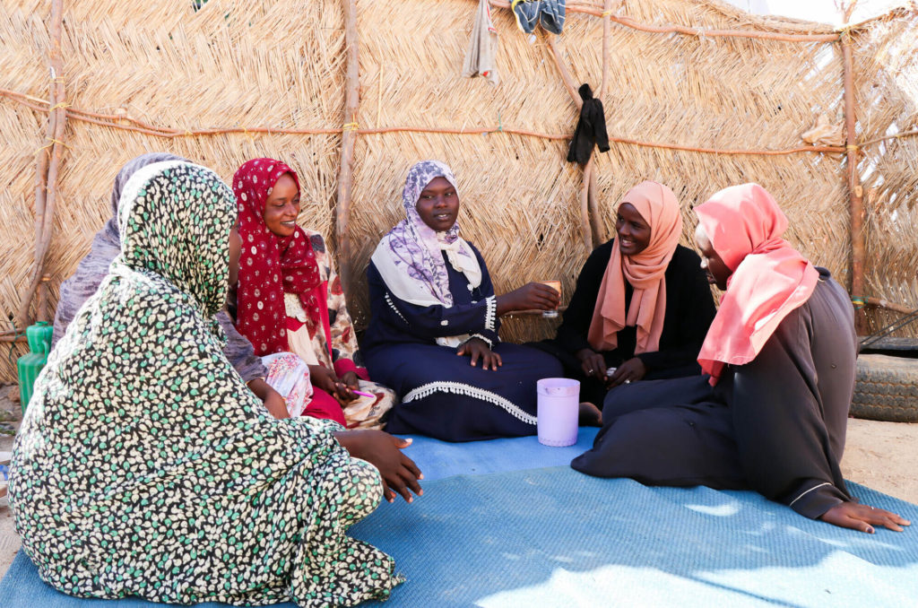 Salud sexual y reproductiva imagen interna Salud sexual y reproductiva, un grupo de mujeres sentadas en el suelo charlando